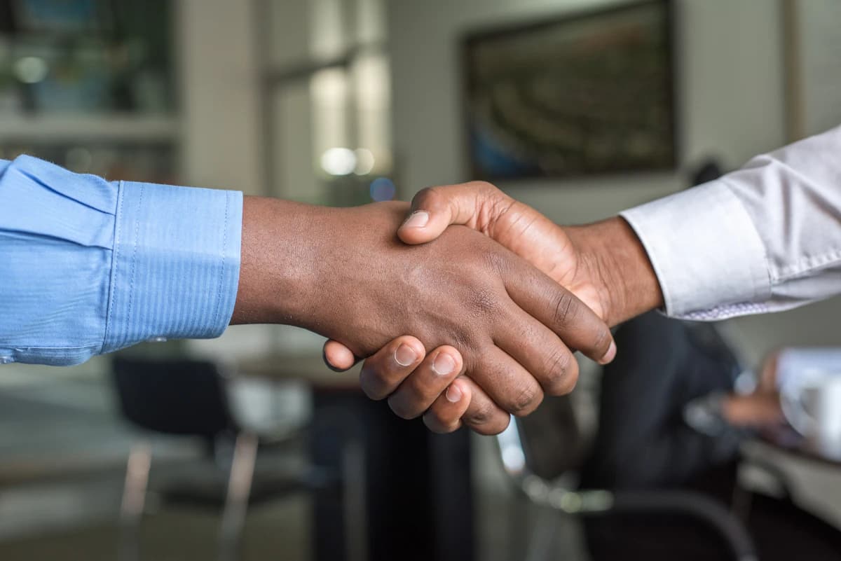 Professional business handshake representing trust